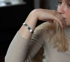 Gorgeous and sophisticated hand-crafted and hammered cuff bangle in Silver or 18ct Gold Vermeil. A beautiful statement piece, easy to wear every day. An exquisite example of true artisan craftmanship, these bangles bear the hallmarks of hands and are each completely unique. HAMMERED OPEN CUFF BANGLE DETAILS The bangle is available in Sterling Silver, 18ct Gold Vermeil All raw materials/gemstones are ethically sourced. SIZE The Bangle is 10mm wide. The size of the circumference of a standard bang Hammered Sterling Silver Bangle Bracelet, Classic Hammered Bracelets, Modern Hammered Bangle Bracelets, Classic Hammered Bracelets As Gift, Classic Hammered Bracelets For Gifts, Classic Hammered Bracelets For Gift, Formal Hammered Cuff Bracelet, Modern Hammered Cuff Bangle, Hammered Bangle Cuff Bracelet For Anniversary