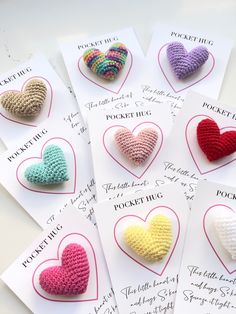 six crocheted hearts are on top of each other