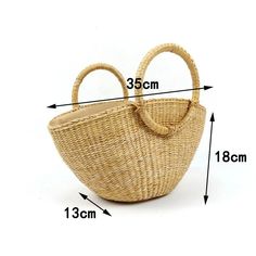 Get ready to tote around your summer essentials with the Emaline Round Handle Straw Basket Bag. Made with natural straw and featuring a stylish round handle, this mini bag adds a touch of fashion to your everyday look. Perfect for a casual day out (and fitting all your must-haves), this bag is a summer must-have! SIZE: Top Width 35cm x H 18cm x D13cm / Top Width13.8" x H7" x D5" Gender" WOMEN Item Type: Handbags, Straw Bag Main Material: Straw Lining Material: CANVAS Handbags Type: Evening Bags Beach Handbag, Beach Outing, Retro Purse, Dumpling Bag, Straw Clutch, Round Handle, Straw Basket, Straw Handbags, Satchel Tote Bag