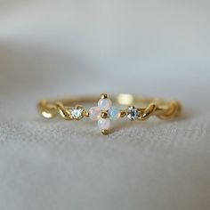 14K Love Me Not Flower Opal Diamond Twist Ring – Tippy Taste Jewelry Delicate Opal Wedding Ring, Delicate Opal Promise Ring, Delicate Yellow Gold Opal Ring, Delicate 14k Gold Opal Ring, Whimsical Gold Wedding Rings, Love Me Not Flower, Delicate Beauty, Twist Ring, He Loves Me