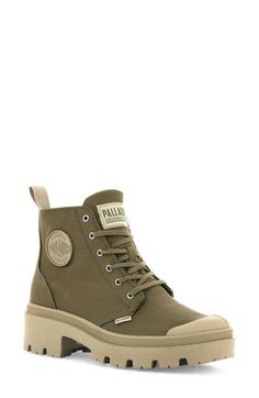 A tonal logo patch accentuates the sporty style of a high-top–inspired bootie set on a sturdy lugged sole. Lace-up style; inside zip closure Textile upper and lining/rubber sole Imported Women's Shoes Casual Low-top Lace-up Boots With Lug Sole, Casual Lace-up Boots With Lug Sole For Outdoor, Trendy Mid-top Boots For Fall, Casual Streetwear High-top Sneakers Ankle Boot, Casual Platform Boots With Lug Sole For Fall, Sporty Fall Boots With Rubber Sole, Casual High Ankle Platform Boots With Lug Sole, Casual Combat Boots With Lug Sole For Fall, Streetwear High-top Lace-up Boots With Reinforced Heel