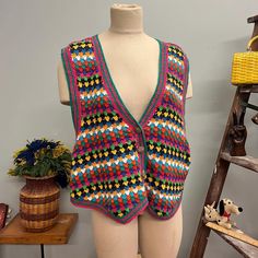 Approx Measurements Lying Flat (size tagged 2 ) Pit to pit: 22" Length (from shoulder to bottom hem): 22" Condition: Great condition Claus Woman brand tag Size tagged 2 55% ramie 45% cotton Fitted Multicolor Knit Sweater Vest, Retro Multicolor Knit Top, Cheap Multicolor V-neck Sweater Vest, Vintage Multicolor Sleeveless Sweater Vest, Retro Multicolor V-neck Sweater, Brand Tags, Sweater Vest, Chunky Knit, Women Brands