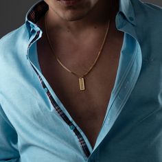 "Discover the essence of personal style with our meticulously crafted 925 sterling silver men's necklace. Designed as a canvas for your individuality, this engravable piece allows you to imprint it with your story, be it a name, a significant date, or a heartfelt message. The allure of this necklace lies not only in its exceptional craftsmanship but also in its minimalist design that seamlessly transitions from everyday wear to special occasions. Its understated elegance exudes sophistication, enhancing your ensemble with a touch of refined masculinity. Choose from the exquisite gold, sleek silver, or bold black finishes to suit your taste and style. Each variation carries its own unique charm, making it an impeccable accessory that embodies your personality. More than just an accessory, t Minimalist Box Chain Necklace For Father's Day, Minimalist Rectangular Pendant Necklace For Father's Day, Father's Day Minimalist Rectangular Pendant Necklace, Elegant Father's Day Necklaces, Silver Mens Necklace, Pendant Necklace Men, Custom Bar Necklace, Mens Necklace, Mens Silver Necklace