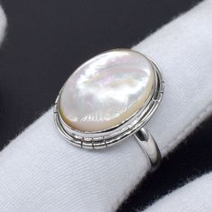 Welcome to your Shop Shop Link : https://uniquejewelstudio.etsy.com Stone: Mother Of Pearl Gemstone Shape: Oval Shape Ring Size:- All Size Ring Weight : 3 to 8 gm Metal:- Pure 925 Sterling Silver Jewelry Type:- Ring Stock Code : SR-1026 Benefits of Mother's Of Pearl, Wearing Mother Of Pearl as jewelry is beneficial to the soft tissue, muscle tissue, heart, and joints. It will help you connect with the power of water, providing calming and subtle energy. This will help to guard you against negati White Pearl Ring Stamped 925 As Gift, Handmade Classic Pearl Ring As A Gift, Handmade Classic Pearl Ring For Gift, Handmade Classic Pearl Ring As Gift, Handmade Silver Ring For Birthday, Silver Oval Ring For Birthday, Handmade Oval Pearl Ring For Anniversary, Birthday Sterling Silver Rings Stamped 925, White Gold Oval Pearl Ring As Gift