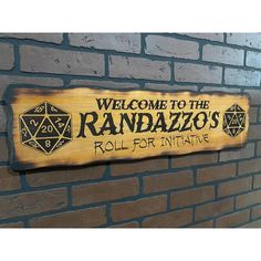 a wooden sign that says welcome to the ranbazzo's roll for adventure