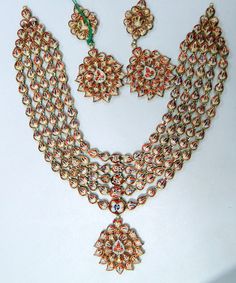 "Classic Vintage elegant 20 carat solid gold, Old cut Diamonds and coloured stones with multicolor Enamel work 5 rows necklace (Kundan Meena choker) with Matching Earrings. Ideal for any occasions A good size necklace with many stands of clear diamonds, great craftmanship. Length of necklace -23 cm (9.05) Size could be adjusted according to your requierment by adding adjustable cord. Width of Center piece-9 cm (3.15\"), total weight of set 141.450 Grams(4.99 ounce). Length of earrings-7 cm,width Heavy Multicolor Jewelry For Ceremonial Occasions, Bold Multicolor Ceremonial Jewelry, Multicolor Jewelry For Ceremonial Festivals, White Motif Jewelry For Diwali, Formal Multicolor Kundan Necklaces, Multicolor Meenakari Jewelry Sets For Festivals, Multicolor Formal Jewelry For Diwali, Multicolor Jewelry For Celebrations & Festivals, Diwali White Motifs Jewelry