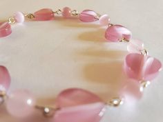 Beautiful pink heart rosary Elegant Pink Beaded Bracelets With Heart Beads, Elegant Pink Heart Beaded Bracelets, Elegant Pink Heart-shaped Beaded Bracelets, Elegant Pink Beaded Bracelet With Heart Charm, Pink Single Strand Beaded Bracelet Gift, Pink Single Strand Beaded Bracelet As Gift, Pink Single Strand Beaded Bracelet For Gift, Pink Rose Quartz Heart Beads Jewelry, Elegant Pink Beaded Heart Bracelet