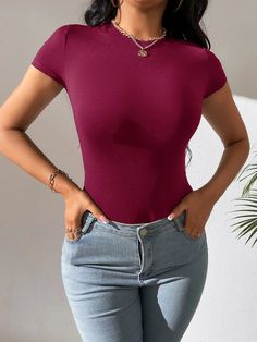 Introducing our Short Sleeve Slim Fit Bodysuit, the perfect addition to your wardrobe. Made from a soft and stretchy fabric, this bodysuit comes in four different colors. Featuring a classic round neckline and short sleeves, this bodysuit is perfect for any occasion. The solid pattern adds a touch of simplicity, making it easy to pair with your favorite pants, shorts, or skirts. Features: Style: Casual Pattern Type: Plain Type: Tee Neckline: Round Neck Sleeve Length: Short Sleeve Sleeve Type: Re Comfy Jumpsuits, Platform Heels Boots, Black And White Baby, Chunky Heel Pumps, Party Heels, Black Hot Pink, Platform Heels Chunky, Black Bodysuit, Solid Pattern