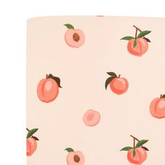 an apple and peach pattern on a white background