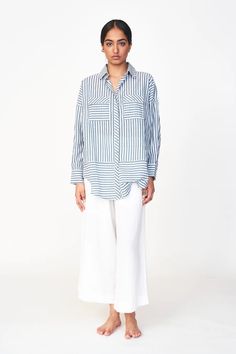 Oversized blouse with front button placket Gathered at back yoke Full length sleeves tapered at cuff with button closure Patch pockets on chest with button flaps Semi sheer 100% cotton Made in India Oversized Blouse With Roll-up Sleeves And Spread Collar, Daywear Shirt With Buttoned Pockets And Spread Collar, Daytime Shirt With Buttoned Pockets And Spread Collar, Oversized Button-up Blouse For Work, Oversized Office Tops With Placket, Classic Daywear Blouse With Buttoned Pockets, Workwear Blouse With Roll-up Long Sleeves, Oversized Blouse With Roll-up Sleeves And Shirttail Hem, Long Sleeve Office Shirt With Buttoned Pockets