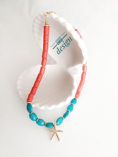 Elevate your style and connect with the soothing energies of the sea with our exquisite Red Coral and Turquoise Natural Stone Necklace. Red Coral, with its vibrant red hue, symbolizes passion and vitality. It is believed to promote courage and inner strength. This unique cylindrical coral pendant adds a bold and distinctive touch to your look. Turquoise, in its beautiful drop shape, is known for its calming and protective properties. It is said to enhance communication and self-expression while promoting a sense of tranquility. The combination of these two natural stones creates a harmonious blend of energy and style. Wear this necklace as a statement piece for special occasions or as an everyday reminder of the ocean's serenity. It's a perfect gift for yourself or a loved one who apprecia Bohemian Beaded Necklace With Starfish Charm As Gift, Bohemian Beaded Necklaces With Starfish Charm For Gifts, Red Adjustable Necklace For Vacation, Adjustable Red Necklace For Vacation, Starfish-shaped Beaded Necklace For Gift, Starfish Shaped Beaded Necklace For Gift, Starfish Shaped Beaded Necklaces For Gift, Ocean-inspired Colorful Bead Necklaces For Gifts, Orange Spiritual Jewelry For Beach