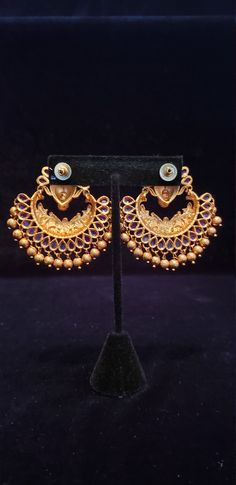 "Handmade Indian Temple Jewelry, best to wear it for traditional ceremonies or Indian wedding. This bridal jewelry has ethnic finish. It has very small Cubic Zircon stones. It is a Bollywood style one gram jewelry These Jhumka Earrings set have an excellent finish and gives out an exquisite sense of style. If you are looking for an amazing Fashion Jewelry set for special occasions such as Anniversary, Engagement, Party, Wedding or for gifting, then your search ends here.. Earring Length: 2.0\", Tilla Chandbali Earrings For Celebration, Celebration Tilla Chandbali Earrings, Traditional Style Tilla Pearl Earrings For Celebration, Traditional Pearl Earrings With Tilla For Celebration, Traditional Gold Earrings For Wedding, Traditional Gold Wedding Earrings, Elegant Jhumkas With Latkans For Ceremonial Occasions, Traditional Round Pearl Earrings For Celebration, Elegant Ceremonial Jhumkas With Latkans