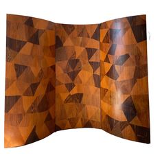 an open wooden book with geometric designs on the front and back cover, in wood grain pattern