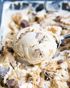 an ice cream sundae with chocolate chips and caramel