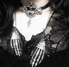 𝔇𝔢𝔱𝔞𝔦𝔩𝔰: Style: Dark wear, Grunge, Goth Materials: Metal Quantity: 1 pc 'Hold my hands in the dark.' This is a goth dark necklace that features the skeleton hands decoration This can be the highlight of your dark look Enjoy free shipping with a purchase of over 80$ Dark Necklace, Dark Look, Skull Hand, Hand Necklace, The Skeleton, Red Necklace, Skeleton Hands, Hold My Hand, Grunge Goth