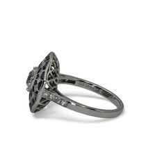 Platinum - Natural Diamond & Blue Sapphire Ring   Metal Type: Platinum (950) Total Item Weight: 5.2 Grams Ring Size: 6.5 (Resizable) 1) Natural Diamond Weight: Center - 0.60 Ct./ Side - 0.153 Ct Diamond Clarity Grade: VVS-VS Diamond Color Grade: F-G Diamond Shape: Center - Old Euro Cut /  Round Shape No. Of Diamonds:  24 2) Stone: Natural Blue Sapphire Stone Weight: 1.25 Ct Stone Shape: Funky Shape Stone Cut: French Cut Stone Color: Blue - Top Quality No. Of Stones: 32 Blue Sapphire Stone, Vvs Diamond, Diamond Color Grade, Blue Sapphire Ring, French Cut, Vs Diamond, Ring Metal, Blue Sapphire Rings, Natural Blue Sapphire