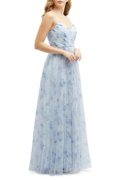 Dreamy blooms and ruched details define a gown that feels like it should come with glass footwear and a pumpkin coach. 55 1/2" length Hidden back-zip closure Surplice V-neck Lined 100% polyester Dry clean Imported Garden Bridesmaids Dresses, Light Blue Bridesmaid, Long Full Skirt, Floral Bridesmaid Dresses, Dessy Collection, Chic Scarves, Floral Bridesmaid, Tulle Bridesmaid Dress, Blue Bridesmaids