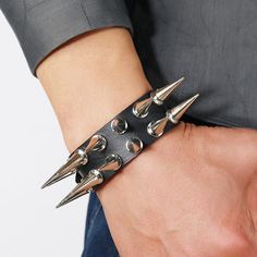 Style: Europe and America Material: Artificial Leather Color: Black Fashion Element: Geometry Punk Leather Bracelet With Spikes For Festival, Punk Leather Bracelet With Spikes, Edgy Black Leather Bracelet With Spikes, Edgy Metal Spike Bracelets, Adjustable Studded Leather Punk Bracelet, Punk Cosplay, Punk Mode, Spike Bracelet, Wrap Armband