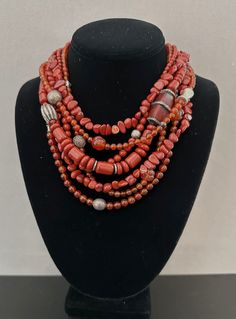 One-of-a-kind statement necklace handcrafted in Scottsdale, Arizona. Beads: 7 strands of red jasper, carnelian, antique and sterling silver Dimensions: approximately 20" + 2" extender Make a statement with this timeless treasure! ﻿Free Shipping ﻿Refund Policy Silver Statement Necklace, Silver Necklace Statement, Scottsdale Arizona, Coral Necklace, Red Jasper, Multi Strand Necklace, Timeless Treasures, Multi Strand, Statement Jewelry