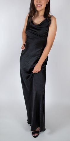 Sexy, sleek, and feminine. This satin cowl neck maxi is perfect for any formal occasion. The perfect touches of sexiness and sophistication. Brand: Nasty Gal Retail Price: $72 Color: Black Hidden Zippered Half Back Polyester Adjustable Straps Model Info: Height: 5'2 Waist: 25'' Wearing a size US 2 *Style notes: This dress has some stretch! Chic Maxi Dress With Cowl Back For Party, Formal Floor-length Bias Cut Slip Dress, Classic Party Maxi Dress, Sleek Formal Floor-length Slip Dress, Satin Cowl Neck Maxi Dress For Formal Occasions, Satin Maxi Dress With Cowl Neck For Formal Events, Chic Cowl Back Maxi Dress For Night Out, Formal Satin Maxi Dress With Cowl Neck, Chic Satin Maxi Dress With Cowl Neck