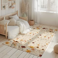 a white bedroom with sunflowers on the floor and bed in front of a window