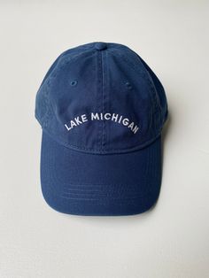 Designed by our own Frances Jaye team member, Tyler, this "Dad Hat" is a classic. The vintage denim color is sure to match every outfit all year round. Embroidered locally in Grand Rapids. Regular fit 100% Cotton Hand wash Cotton Hats For Everyday Fall Wear, Everyday Cotton Hats For Fall, Everyday Fall Cotton Hats, Fall Everyday Cotton Hats, Vintage Blue Hats With Letter Print, Washed Blue Cotton Cap, Vintage Blue Cotton Dad Hat, Classic Summer Hats With Embroidered Logo, Retro Cotton Hat With Embroidered Logo