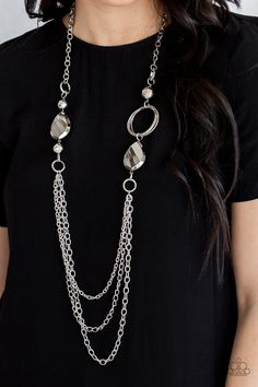 A mismatched collection of oversized silver beads, hoops, and textured silver accents give way to layers of antiqued silver chains down the chest for an edgy industrial look. Features an adjustable clasp closure.

 Sold as one individual necklace. Includes one pair of matching earrings. Silver Chains, Long Chain Necklace, Paparazzi Accessories, Black Necklace, Silver Accessories, Paparazzi Jewelry, Silver Accents, Brass Chain, Necklace Earring Set