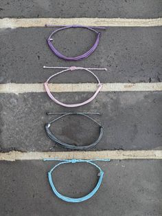 P U R A V I D A B R A C E L E T these pura vida inspired bracelets are made so that you can have a similar bracelet for cheaper! these are durable, so you do not have to worry about the string breaking. these bracelets are waterproof, so you can wear them in the water and are also adjustable, so you do not have to worry about the fit. these bracelets are made extra-long, so that one size can fit all. however, if the ends are too long for your taste, you can simply cut, tie, and burn the ends. ea Casual Resizable Braided Friendship Bracelets, Casual Friendship Bracelets With Adjustable Waxed Cord, Casual Nylon Cord Friendship Bracelets With Adjustable Length, Casual Everyday Friendship Bracelets With Waxed Cord, Casual Everyday Friendship Bracelets Waxed Cord, Trendy Braided Bracelets With Waxed Cord, Adjustable Nylon Cord Friendship Bracelet, Trendy Braided Bracelets With Adjustable Band For Gifts, Casual Braided Bracelets With Sliding Knot