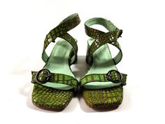 Handmade pistachio green croco leather sandals in chunky low heel. Modern strappy design with square toe and adjustable straps, that embrace and flatters all feet types! Their low block heel and their very soft insole offer true comfort. Genuine leather on the upper and inner parts, soft leather lining and antislip elastic rubber sole. High quality shoes, guaranteed to last for a long long time! PRODUCT INFO Color: green Upper material: 100% leather Linning: 100% leather Heel: leather wrapped He Green Square Toe Heels For Spring, Spring Green Square Toe Heels, Trendy Green Slingback Sandals With Round Toe, Trendy Green Block Heel Sandals, Trendy Leather Block Heel Slingback Sandals, Trendy Green High Heel Block Heels, Trendy Green Heels With Heel Strap, Green Block Heel Shoes For Spring, Trendy Green Block Heels With Round Toe