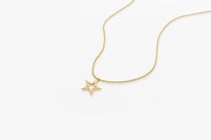 Gold KT: 14K Charm 10mm x 10mm The delicate gold chain holds a beautifully crafted star charm, symbolizing hope and good fortune. Measuring approximately 10 x 10 mm in size, this necklace is the perfect size for everyday wear. Whether you're looking for a special gift for a loved one or simply treating yourself to a beautiful piece of jewelry, this lucky star charm necklace is a timeless and meaningful choice. Star Necklace Gold Thick Chain, Yellow Gold Star Charm Pendant Necklace, Yellow Gold Everyday Charm Necklace With Star Charm, Elegant Star Charm Necklace, Tarnish Resistant, Yellow Gold Star Of David Necklace With Delicate Chain, Elegant Star-shaped Tarnish Resistant Charm Necklace, Everyday Yellow Gold Charm Necklace With Star, Everyday Yellow Gold Necklace With Star Charm, Minimalist Yellow Gold Star Of David Necklace