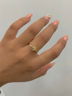 -14K Diamond Ring  -100% gold  - Size 7  - Cubic zirconia. -Yellow Gold.  - Item sold by piece. Weight undetermined. Rose Gold Bar, Bow Ring, Gold Bar, Name Necklace, Rings Statement, Statement Rings, Diamond Ring, Cubic Zirconia, Jewelry Rings