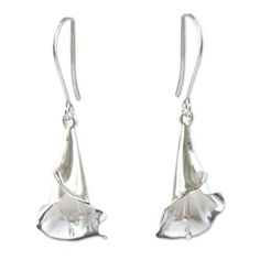 Calla lilies are believed to symbolize magnificent beauty and so inspire the design of these earrings by Regina Flores Montes. The luminous silver earrings are crafted by hand with extraordinary detail. .950 Silver Calla Flower, Paw Print Jewelry, Ribbon Jewelry, Silver Flower Earrings, By Regina, Calla Lilies, Printed Jewelry, Jewelry Packaging, Silver Flowers