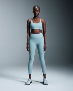 Soft, sweat-wicking, and complete with side pockets to hold your phone – these versatile tights are ideal for everyday wear. Pair them with your favorite On sneaker. A high-waisted fit means once your tights are pulled up, they actually stay up. (No adjustment-gymnastics on our watch.) The wide, smooth cut ensures a secure fit, and the longer length gives you extra coverage. The super-soft, full-length Movement Tights are your perfect partner whether hiking, working on your practice, or just rel Womens Movement, Sports Bra Design, Low Intensity Workout, Running Accessories, Padded Sports Bra, Travel Shoes, Low Impact Workout, Tennis Clothes, Womens Tights