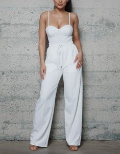 Knit White Wide Leg Pants With drawstrings Wide-leg Lounge Pants With Drawstring, Chic White Bottoms With Drawstring, Chic White Drawstring Bottoms, Chic White Drawstring Pants, White Stretch Bottoms With Drawstring, Lounging Pants With Drawstring And Straight Cut, Wide-leg Drawstring Pants For Lounging, Fitted Cotton Joggers With Drawstring, White Drawstring Trousers