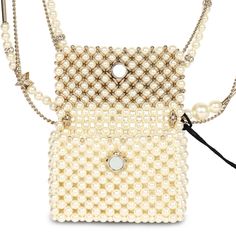 This Chanel flap bag pendant necklace is made of pearls with light gold tone hardware and features a front flap with signature CC magnetic closure, and a light gold tone chain link with pearl, CC pendants, and star pendants.Collection: 23AOrigin: FranceCondition: New and never wornAccompanied by: Chanel pouch, retail UPC and carebookMeasurements: 2" x 1.75" pendant; 23.5" chain length Chic Evening Pearl Necklace, Luxury Gold Pearl Necklace For Evening, Luxury Pearl Necklace With Chain, Luxury Formal Pearl Necklace With Chain, Luxury Pearl Necklace With Pearl Charm For Parties, Luxury Rectangular Necklace For Evening, Luxury Rectangular Evening Necklace, Elegant Gold Bag With Pearl Chain, Luxury Pearl Charm Necklace For Evening