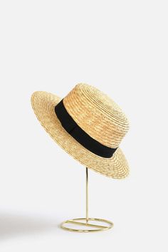 Bring classically chic flair to your summer look with the Abella Classic French Boater Hat. This classic French accessory is made from breathable straw and designed with an adjustable pull string for the perfect fit. You'll love the elegant aesthetic this piece adds to any ensemble.Head circumference: 55.5cm (designed with adjustable pull string for the perfect fit)Your purchase can also be made at:www.enbelleepoque.com Chic Spring Boater Hat Made Of Paper Straw, Elegant Brimmed Straw Hat Made Of Paper Straw, Chic Boater Hat With Short Brim In Toquilla Straw, Adjustable Natural Boater Hat With Short Brim, Adjustable Woven Fedora For Spring, Elegant Spring Straw Sun Hat, Elegant Woven Brimmed Boater Hat, Spring Flat Brim Paper Straw Hat, Short Brim Boater Hat In Paper Straw For Spring