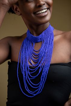 Unique Africa Maasai Handcrafted Beaded Necklace with an Elegant Look and Brilliant Finish. Color = Royal Blue. Length (Around Neck) = Adjustable. Length ( Downwards ) = 11.5 Inches / 30 Centimeters. **GET FREE SHIPPING FOR ADDITIONAL ITEMS PURCHASED. Yes, Buy Multiple Items and pay shipping for 1 item only- The rest ships Free. (No Limits on the number of Multiple items). With a faster delivery time of 3 days via DHLExpress, Worldwide. Ordinary/Standard Shipping also available upon request. We Traditional Blue Beaded Jewelry, Traditional Blue Beaded Necklaces, Blue Beaded Necklaces With Tiny Beads For Party, Traditional Blue Handmade Choker, Blue Beaded Necklace With Tiny Beads For Party, Blue Beaded Necklace For Party, Adjustable Royal Blue Bohemian Jewelry, Adjustable Bohemian Royal Blue Jewelry, Blue Tiny Beads For Party