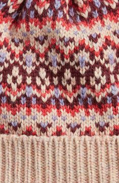 A colorful pom tops this cozy beanie that gets seasonal flair from a classic Fair Isle pattern. 44% acrylic, 43% nylon, 13% polyester Hand wash, dry flat Imported Fair Isle Knit Hat Free Pattern, Warm Multicolor Beanie For Fall, Cozy Multicolor Fall Hats, Multicolor Soft Knit Beanie For Cold Weather, Fairisle Beanie Knitting Patterns, Knit Hat Fair Isle, Chunky Fair Isle Knit Hat, Winter Fair Isle Pattern Beanie Hat, Fair Isle Pattern