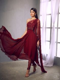 Maroon kurta with an embroidered drape and a pair of embroidered pantsFrom Shloka Khialani' s Fiorente collection.DELIVERY TIMEPlease allow 6-8 weeks for your outfit to arrive.FABRIC DETAILSSilk, Crepe, Georgette, NetProfessional cleaning only. Festive Pant Set With Sheer Dupatta, Traditional Pant Set With Sheer Dupatta For Party, Bollywood Style Pant Set With Sheer Dupatta For Festivals, Traditional Pant Set With Sheer Dupatta And Traditional Drape, Navratri Palazzo Set With Zari Work And Cape Sleeves, Traditional Pant Set With Sheer Dupatta And Drape, Anarkali Palazzo Set With Cape Sleeves For Navratri, Festive Pant Set With Sheer Dupatta For Navratri, Festive Palazzo Set With Cape Sleeves For Navratri