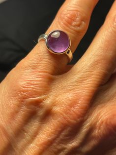 Round Cabochon Amethyst Ring, Hand cast in Sterling Silver. Sterling Silver high bezel, Purple Amethyst, February Birthstone Size 5.5 US flower motif...one of my favorite castings, only a few ever made Item#214 Classic Round Cabochon Gemstones, Anniversary Cabochon Gemstones, Purple Amethyst Ring Hallmarked Round Cut, Hallmarked Purple Amethyst Round Cut Ring, Hallmarked Purple Amethyst Ring With Round Cut, Purple Hallmarked Amethyst Ring, Classic Amethyst Birthstone, Classic Amethyst Oval Cabochon Ring, Purple Amethyst Ring With Accent Stones