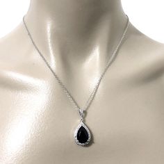 "A something blue navy sapphire cz drop bridal necklace with teardrop pendant made of cubic zirconia teardrop and brilliant cz hanging onto white gold silver rhodium bail and chain. You may also choose violet purple, emerald green or topaz brown pear drop to match your outfit or as a gift. Pendant is 1 1/4\" (3.1cm). Chain length can be added with a 2\" extender chain. View matching, similar design and other color options at https://etsy.me/2XN9lO3 View all something blue designs at https://etsy Formal Teardrop Pendant Jewelry Sets With Cubic Zirconia, Formal Cubic Zirconia Jewelry Set With Teardrop Pendant, Cubic Zirconia Pendant Jewelry Sets For Wedding, Elegant Formal Jewelry Sets With Teardrop Pendant, Elegant Teardrop Pendant Jewelry Sets For Formal Occasions, Teardrop Pendant Jewelry With Diamond Accents For Party, Hand-set Pear-shaped Cubic Zirconia Jewelry, Fine Jewelry Teardrop Pendant Bridal Necklace, Formal Cubic Zirconia Teardrop Pendant Bridal Necklace