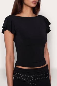 Our Soffiano Top has a fitted matte jersey bodice that sits just above the hips with a slightly draped back, and a boat neck with ruffled cap sleeves. Composition: 92% Polyester, 8% Spandex Dani is wearing a size S and is 5'10" with a 32" bust, 35" hips, and 25" waist Chic Fitted Top With Ruffle Sleeves, Chic Fitted Tops With Ruffle Sleeve, Chic Fitted Ruffle Sleeve Tops, Chic Fitted Tops With Cap Sleeve, Fitted Top With Ruched Sides, Chic Fitted Cap Sleeve Tops, Fitted Tops With Ruffle Sleeves For Night Out, Fitted Scoop Neck Top With Ruffles, Fitted Ruched Scoop Neck Top