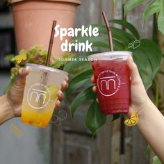 two people holding up drinks with the words sparkle drink and summer season written on them