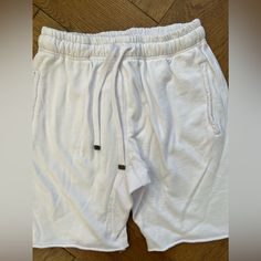 Size Medium Color White Drawstring Pockets 100% Cotton Measurements Taken Laying Flat Waist 14” Rise 13” Inseam 8” White Knee-length Shorts For Loungewear, White Jogging Bottoms With Built-in Shorts, White Compressive Breathable Shorts, White Nylon Athletic Shorts With Built-in Liner, White Cotton Bottoms With Built-in Shorts, Shorts White, Sweat Shorts, Mustard Yellow, White Shorts