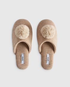 Few things are more luxurious than draping yourself in cashmere—and there’s no reason your feet should miss out on the fun. Soft, cozy and crafted from the finest Mongolian cashmere, these slippers deliver lightweight plushness with a memory foam insole that will have you feeling like you’re walking on air. Add in that they’re easy to slip on with a no-skid bottom and you’ve found your new favorite shoe. Cashmere Socks, Cashmere Throw, Cute Slippers, Moccasins Slippers, Slippers Cozy, Faux Fur Pom Pom, On Air, House Shoes, No Show Socks