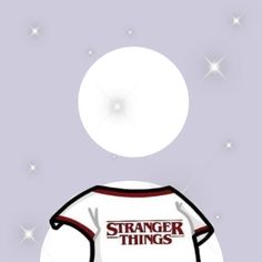 a t - shirt with the words strange things on it is floating in the air