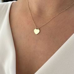 14K Gold Heart Necklace, Minimalist Love Necklace, Wedding Gift The heart shape is universally recognized as a symbol of love and affection. Wearing heart jewelry can indicate a romantic relationship, deep emotional connection, or a loving sentiment toward someone as well as self-love and self-care. Heart jewelry, especially when given as a gift, can symbolize a commitment to a romantic partner or a pledge of loyalty and devotion. It might also represent the idea of giving one's heart to another Pledge Of Loyalty, Relationship Necklaces, Gold Dainty Necklace, Romantic Partner, Minimal Gold, Romantic Relationship, Turtle Necklace, Heart Pendant Gold, Dainty Gold Necklace