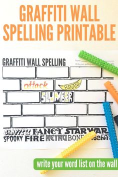 some legos are laying on top of a paper with the words graffiti wall spelling printable