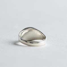 >Modern classic signet ring with hand graving initial. >925 sterling silver hallmarked >Sterling silver is an almost pure metal made from 92.5% Silver. >Approx. 10mmx9mm oval face and 2.5mm band width. FREE SHIPPING USA- All of our jewelry will arrive in custom packaging ready for gift giving. CARE: To prolong the color and shine of your jewelry, avoid contact with perfume, lotion, and water. Store in a bag or jewelry box. SATISFACTION GUARANTEED All pieces are carefully examined pri Silver Timeless Initial Ring For Anniversary, Timeless Silver Initial Ring For Anniversary, Minimalist Oval Sterling Silver Signet Ring, Timeless Silver Initial Ring, Classic Sterling Silver Dome Promise Ring, Classic Silver Initial Ring For Formal Occasions, Timeless Sterling Silver Open Signet Ring, Minimalist Oval Engraved Ring Stamped 925, Sterling Silver Initial Ring With Hallmarks