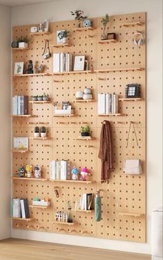 a wooden shelf with many books and other items on it in front of a wall